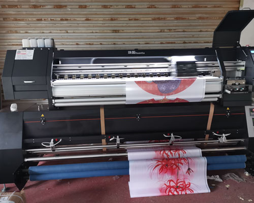 湖南登騰技術(shù)一步到位 現(xiàn)場測試煥圖雙頭寫真機(jī)